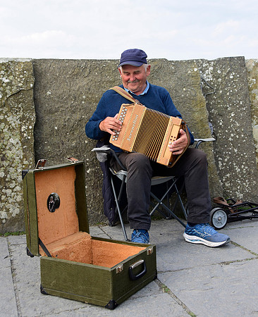 Concertina player at the Cliffs sm